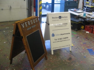 aboard with chalkboard surface wooden sign Oxford London Abingdon Witney