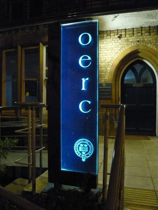 edge lit glass sign illuminated Oxford London